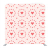 Tiny red hearts pattern with orange background Media wall - Backdropsource